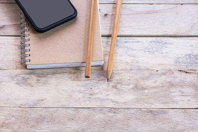 High angle view of telephone on table