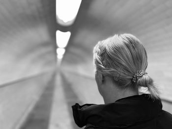 Rear view of woman looking away