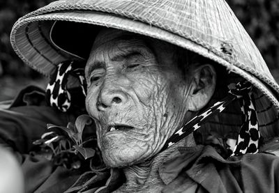 Close-up of woman looking away