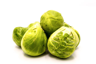 Close-up of green pepper against white background