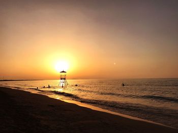 Scenic view of beach during sunset