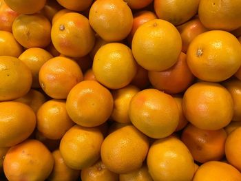 Full frame shot of oranges in market