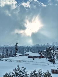 High angle view of snow covered landscape against sky