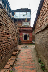 Entrance of historic building against sky