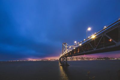 Low angle view of golden gate bridge at night