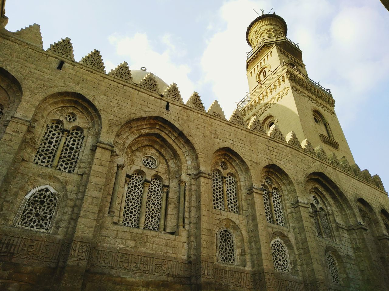 history, low angle view, architecture, the past, sky, built structure, religion, arch, building exterior, spirituality, no people, travel destinations, day, outdoors, ancient, place of worship, ancient civilization, statue, rose window