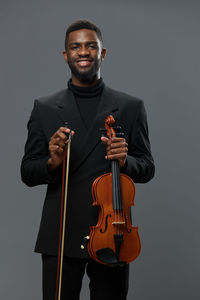 Portrait of violin against white background