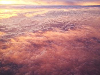 Aerial view of clouds in sky during sunset