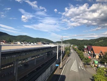 High angle view of bridge over city against sky