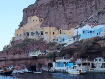 Buildings by mountain