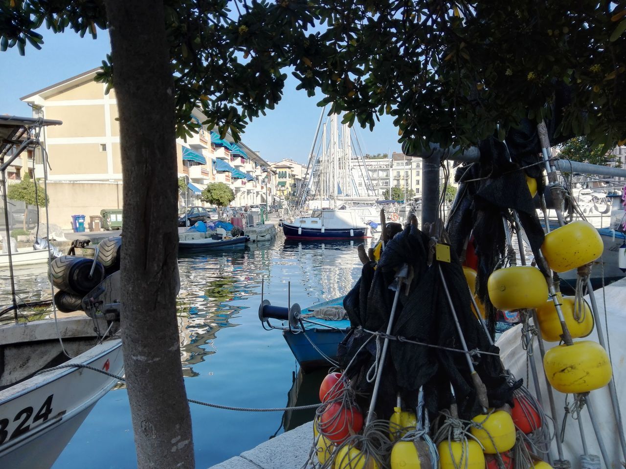 PANORAMIC VIEW OF HARBOR AGAINST SKY