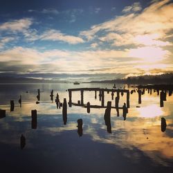 Scenic view of sea against sky at sunset