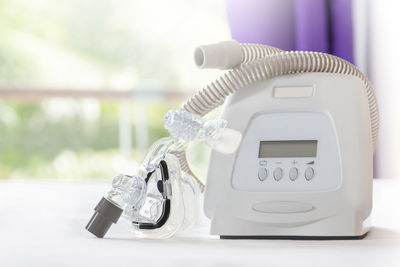 Close-up of medical equipment on table