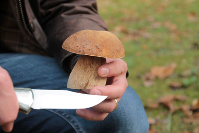 Close-up of man holding ice cream