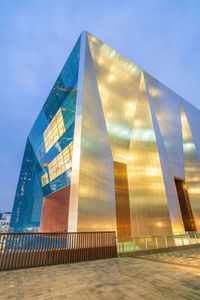 Low angle view of modern building against sky