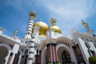 Low angle view of ubudiah mosque against sky