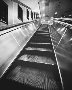 Low angle view of escalator in building