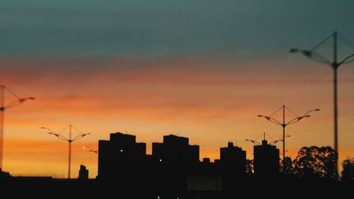 Silhouette of buildings at sunset