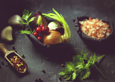 Close-up of food in bowls on slate