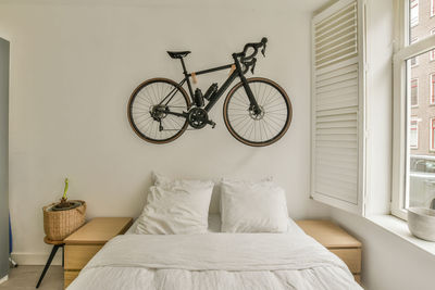 Bicycle on bed at home