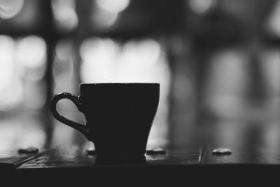 Close-up of coffee cup on table