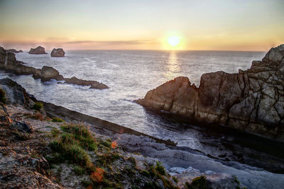 Scenic view of sea against sky during sunset