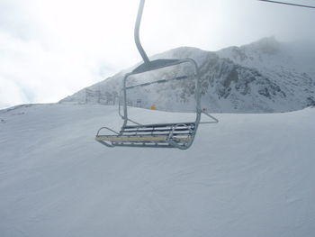 People skiing on snow covered mountain