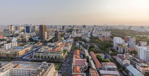 Aerial view of cityscape against sky