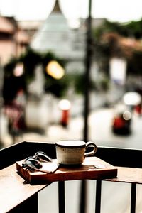 Close-up of coffee cup on table
