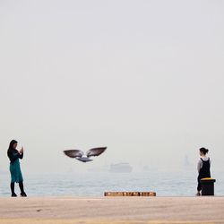 Two men on beach