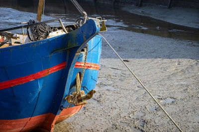 High angle view of fishing boats moored at shore