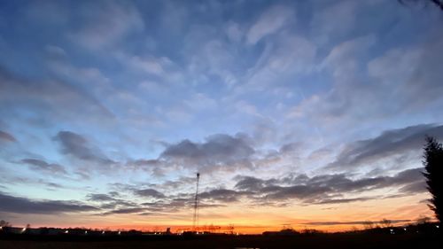 Low angle view of dramatic sky during sunset