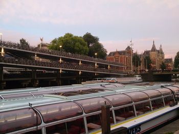 Train at railroad station against sky