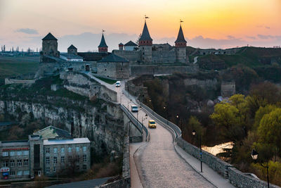 Panoramic view of bridge against sky during sunset