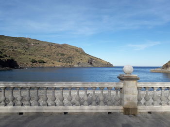 Scenic view of sea against blue sky