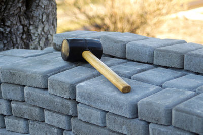Close-up of hammer on wood