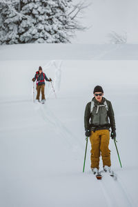 Man skiing on snow