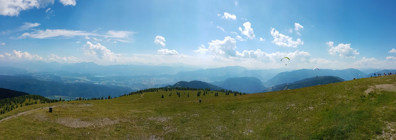 Panoramic view of field against sky