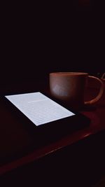 Close-up of coffee cup on table