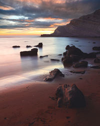 Scenic view of sea against sky during sunset