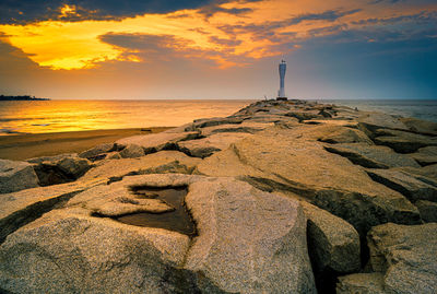 Scenic view of sea against sky during sunset