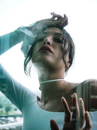 Portrait of a young woman looking away