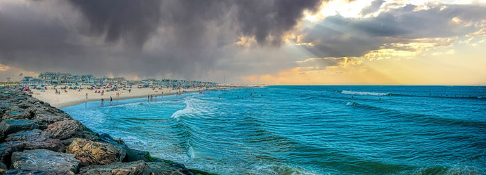 Scenic view of sea against sky during sunset