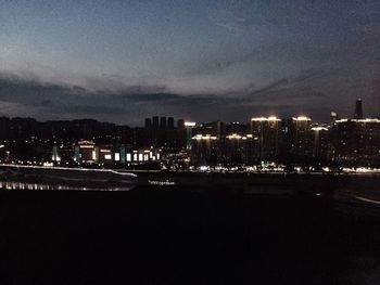 Illuminated cityscape at night