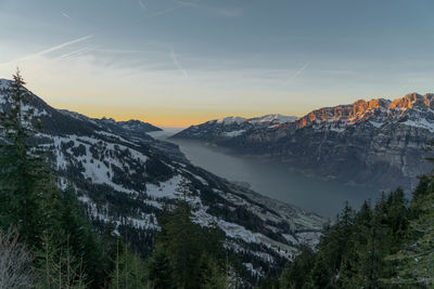Scenic view of mountains against sky during sunset