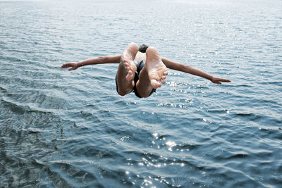 Man swimming in sea