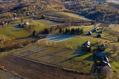Aerial view of autumn mountain countryside farm by drone