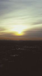 Scenic view of silhouette landscape against sky during sunset