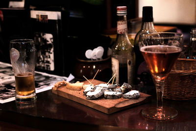 Close-up of wine bottles on table