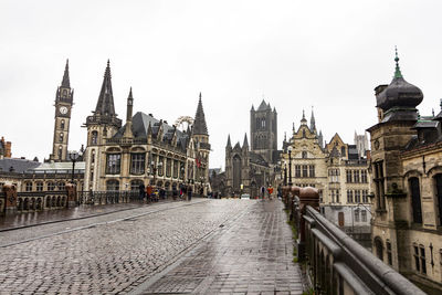 View of buildings in city against sky